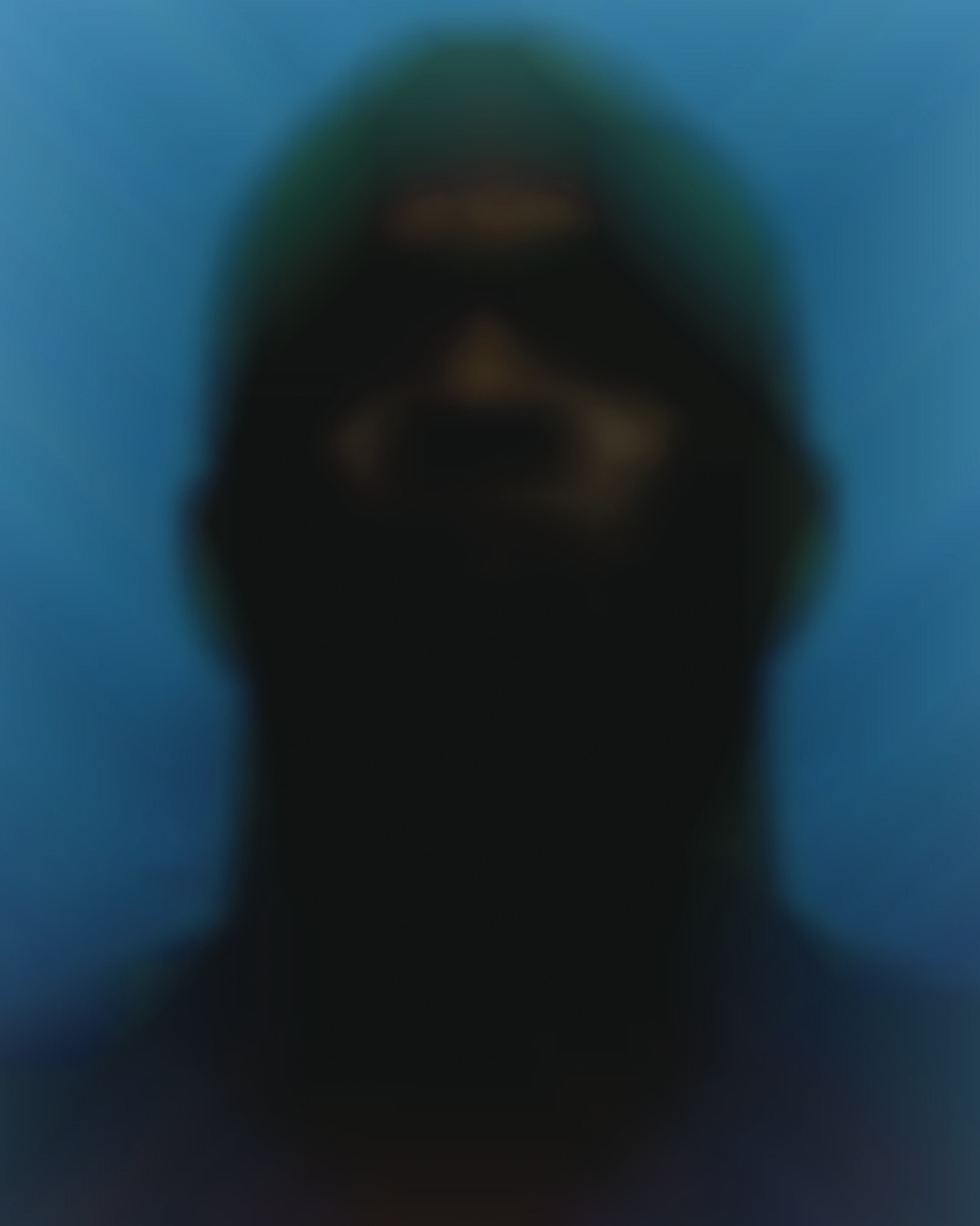 blue background blurred face man