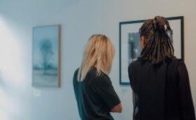 Women looking at gallery