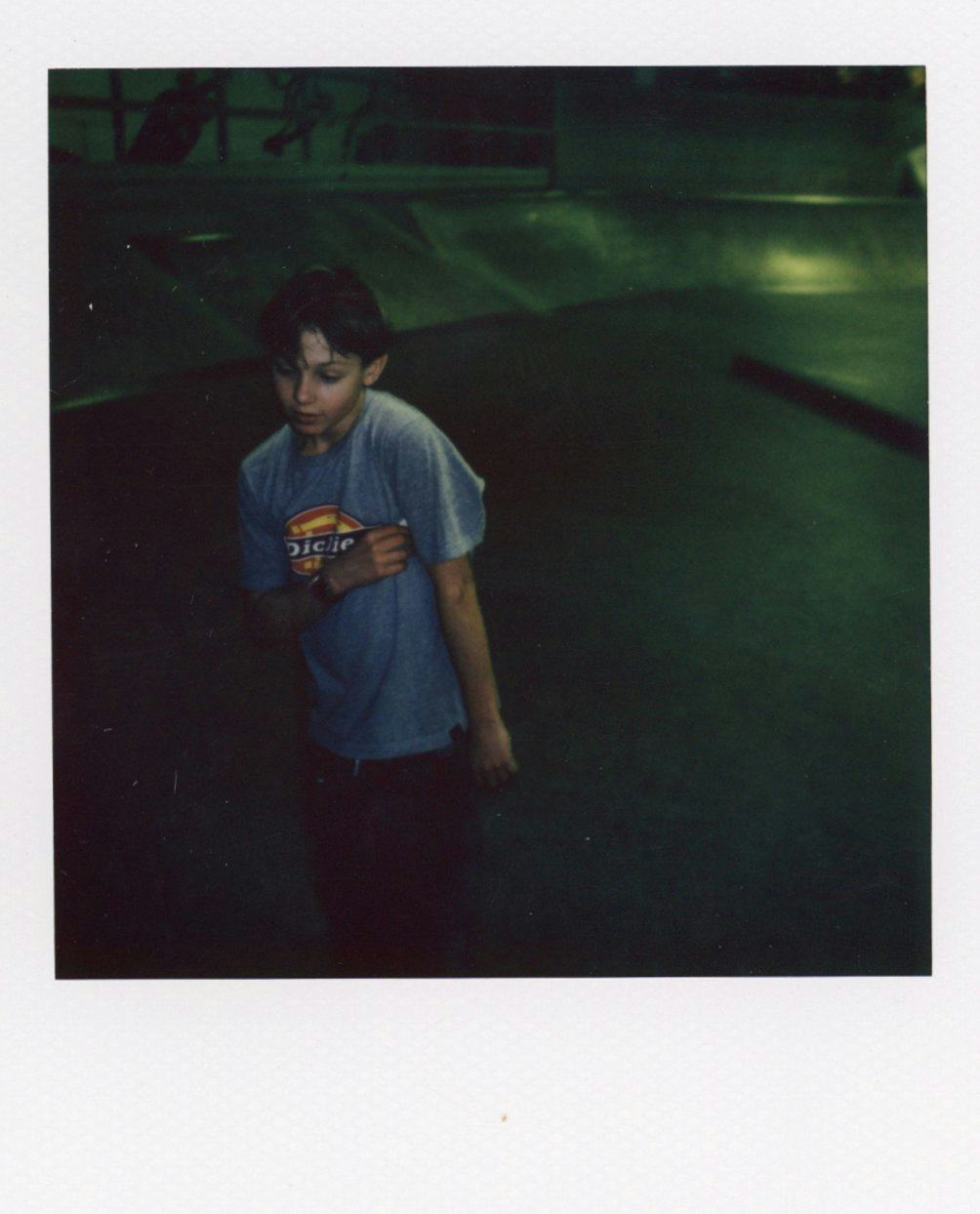 Polaroid of kid in skatepark