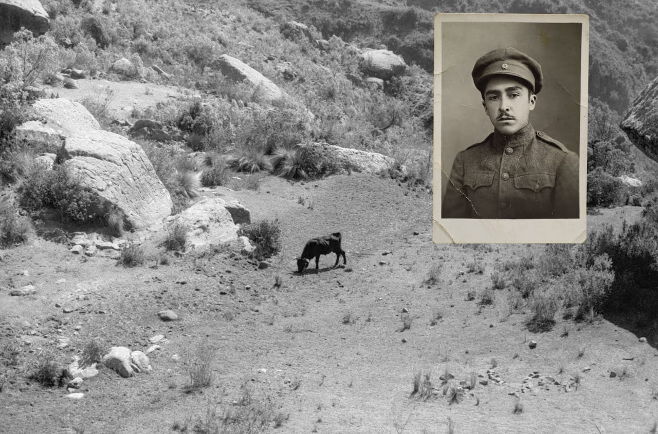 A black and white photo of a soldier in uniform is overlaid on a rocky landscape with a grazing goat.