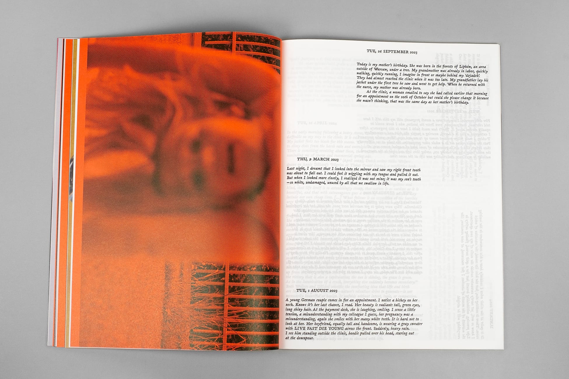 Open magazine on gray surface: left page an orange halftone portrait, right page white with black printed diary-style text.