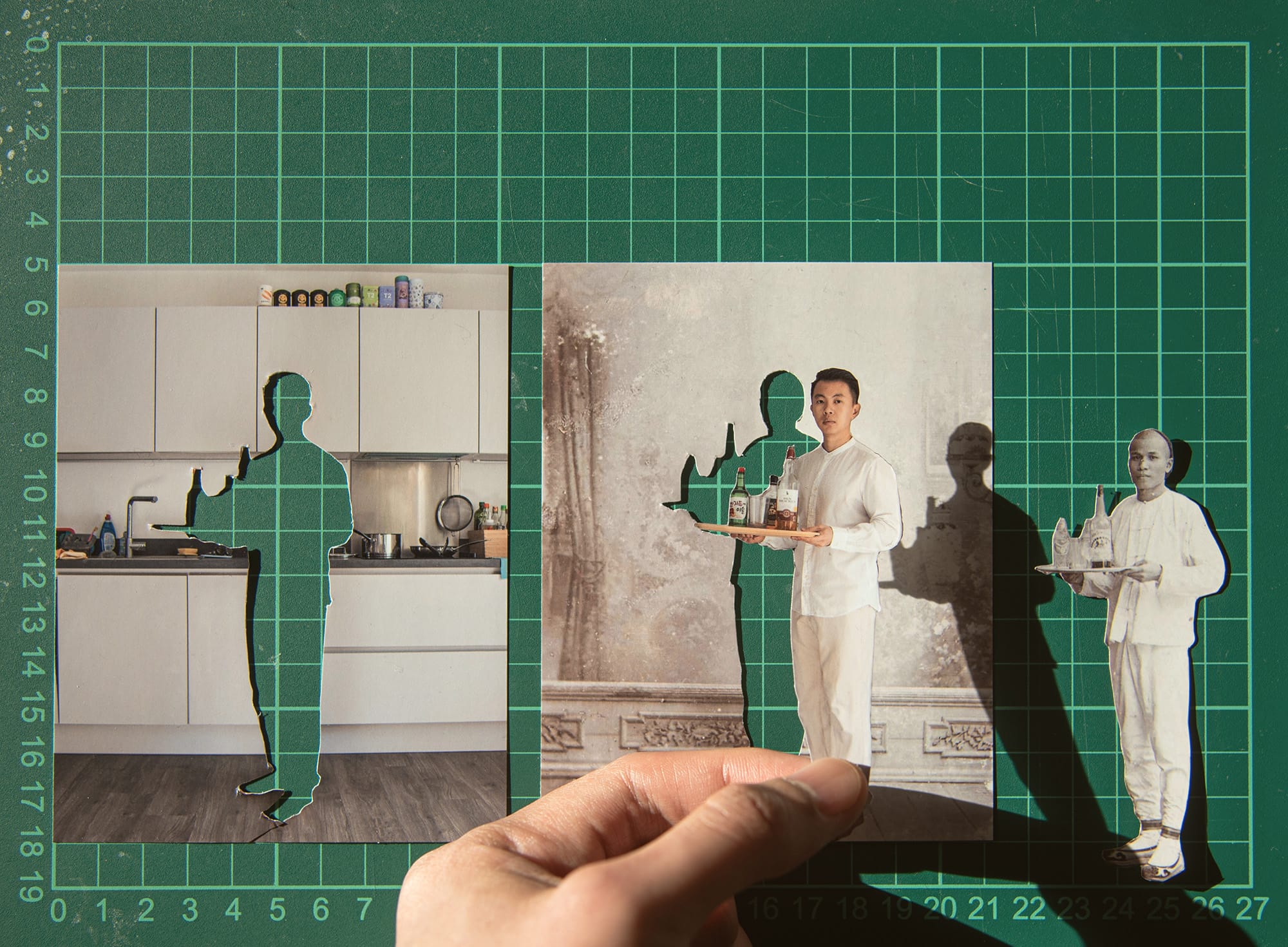 A hand holds a cut-out figure, revealing backgrounds of a kitchen and historical settings. Silhouettes align with the images on a green grid mat.