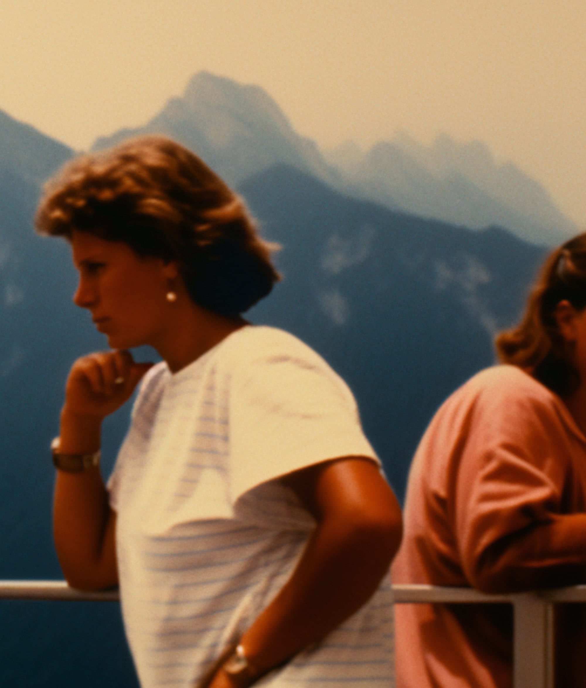 A.I. generated collaged image showing two women standing in front of a mountain panorama© Sander Coers
