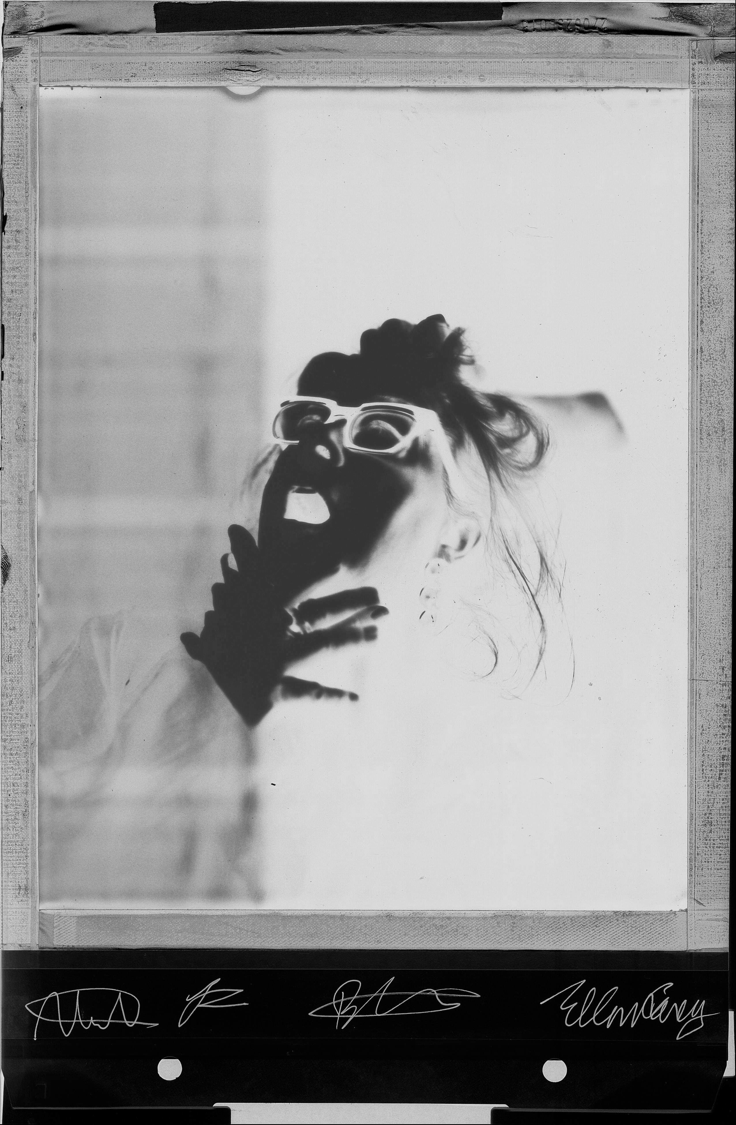 Polaroid portrait woman looking up BW