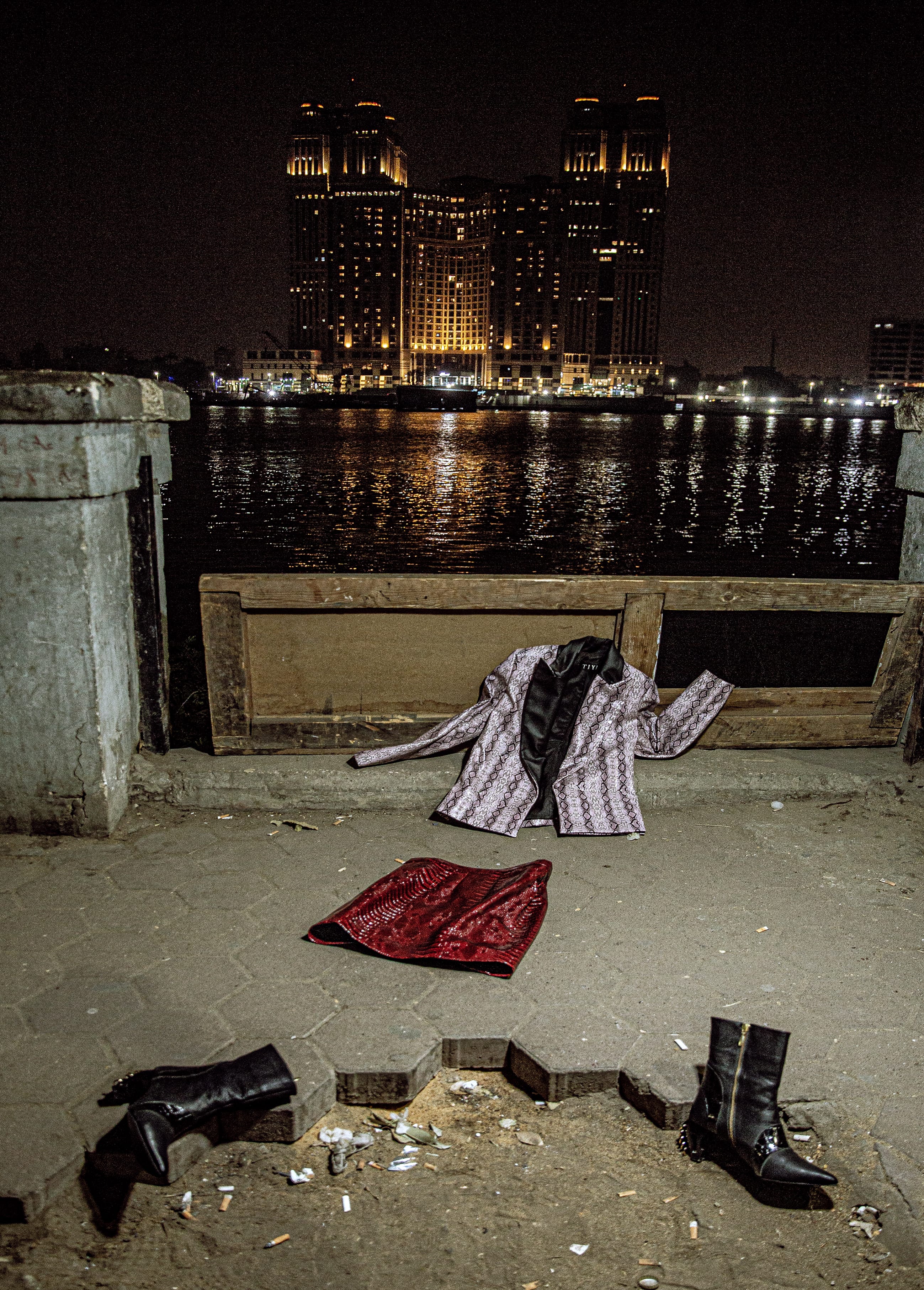 Clothes laid out on the sidewalk