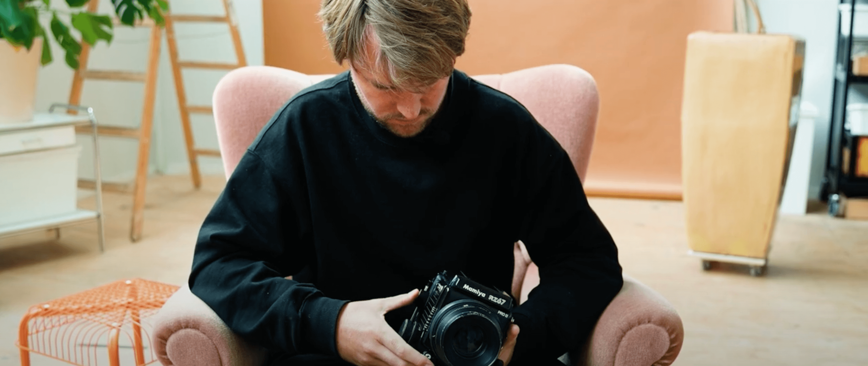 Artist Sem Langendijk showing one of his analogue cameras