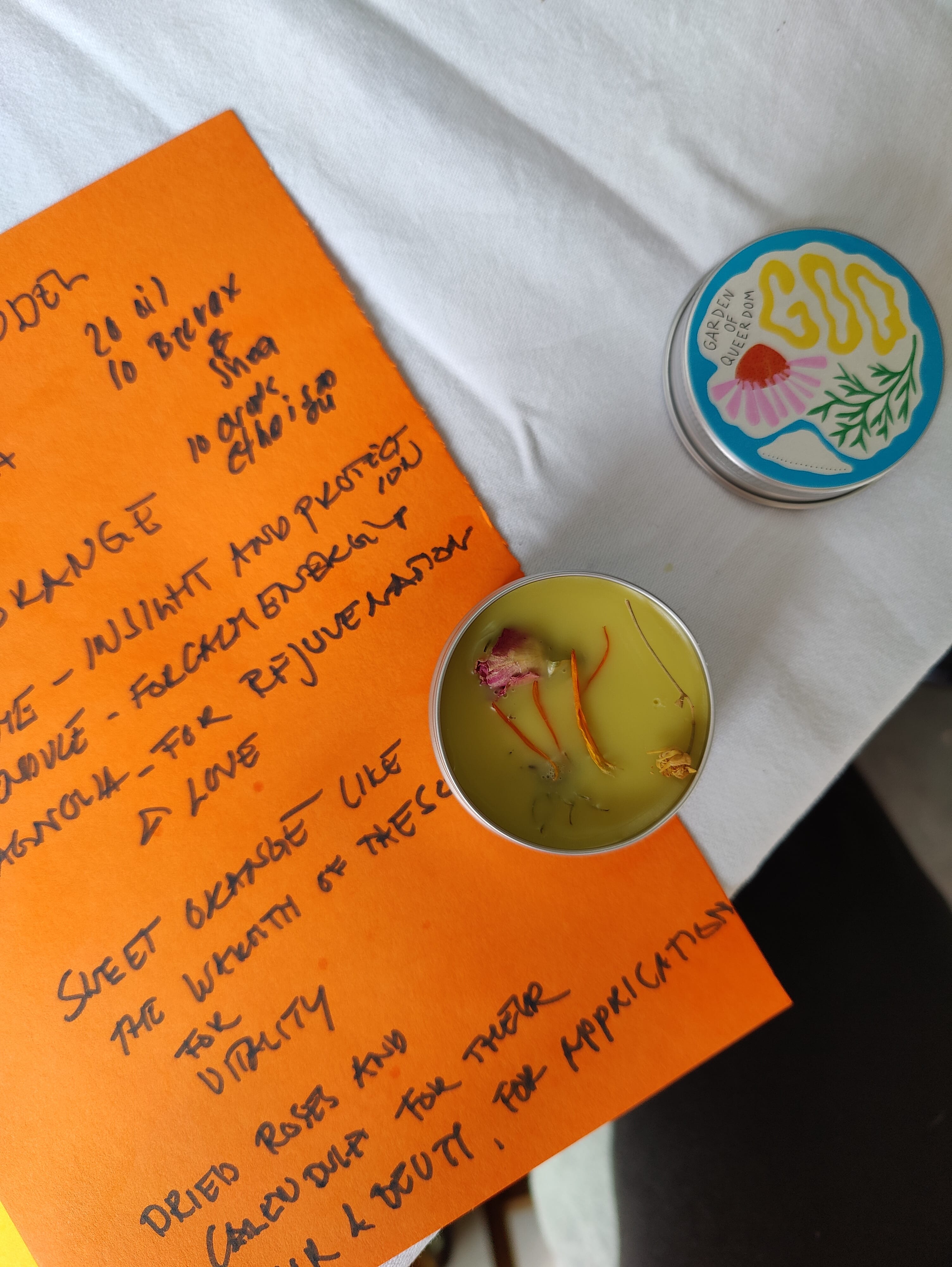 Orange piece of paper on table