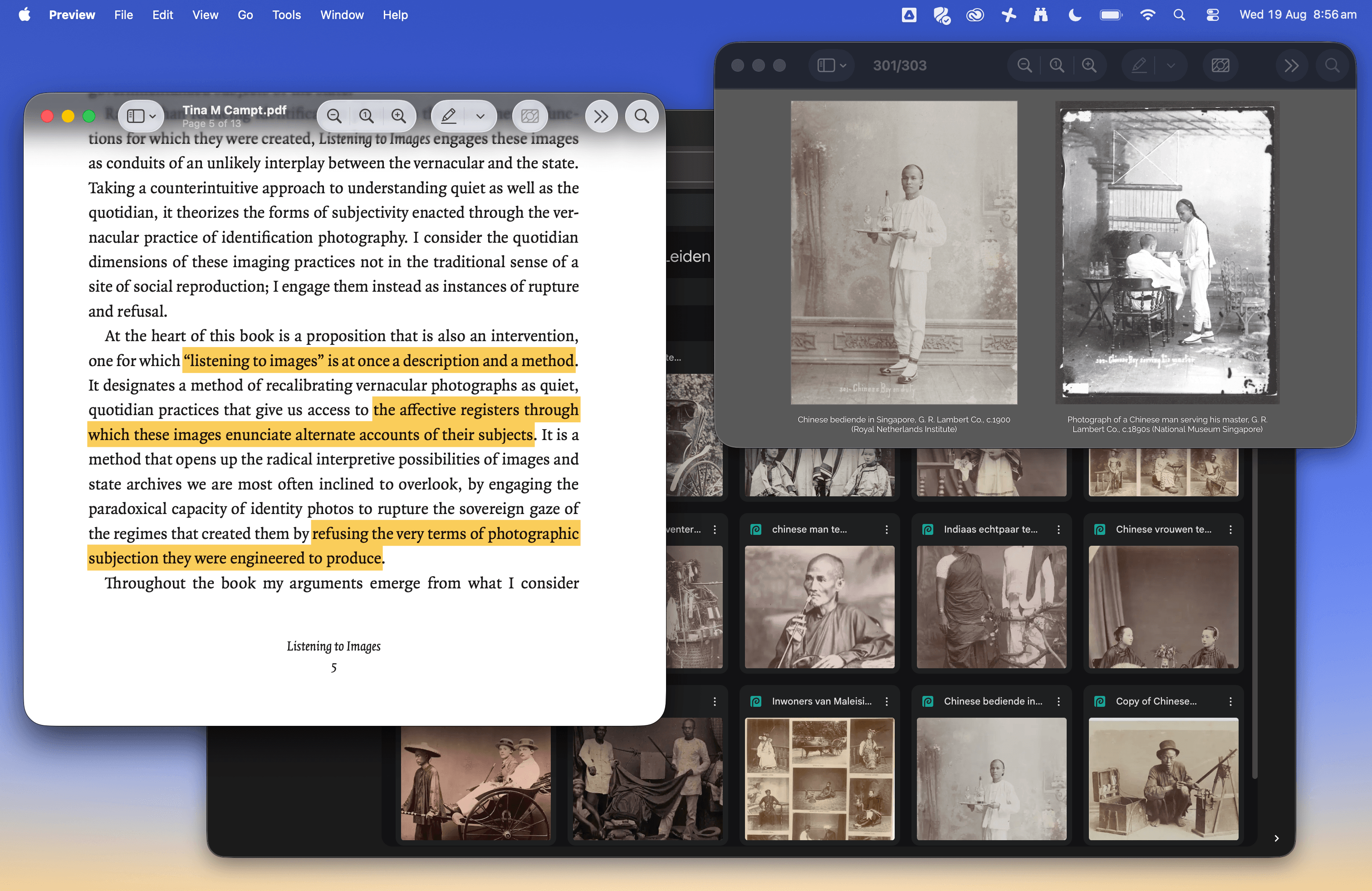 A digital screen displays a text excerpt with highlighted sections and vintage photos, including a man in a servant role, in separate windows.