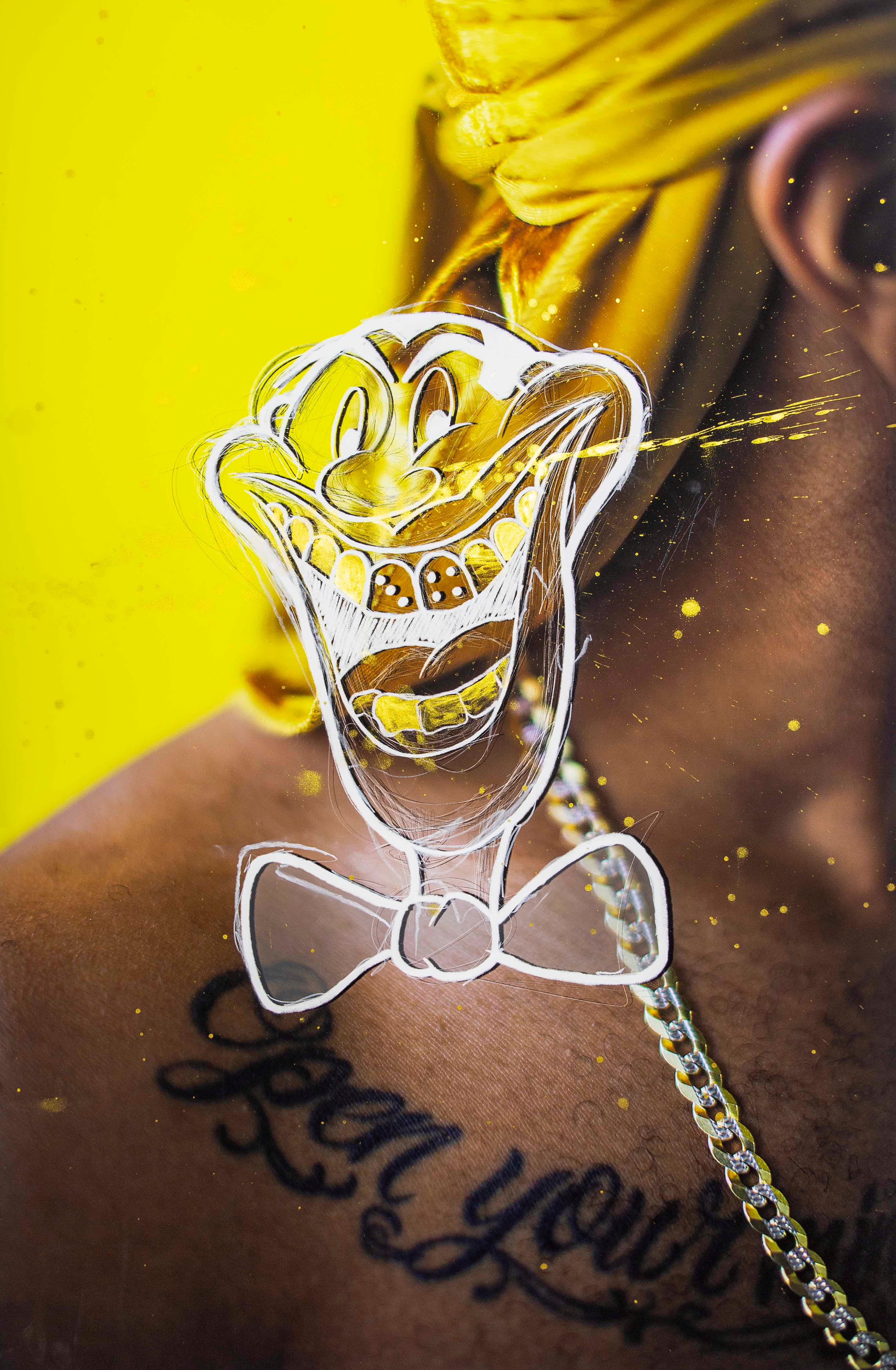 Close-up image of a Black man's neck and shoulder, showing a tattoo and a yellow background and a caricature drawing on top. © André Ramos-Woodard