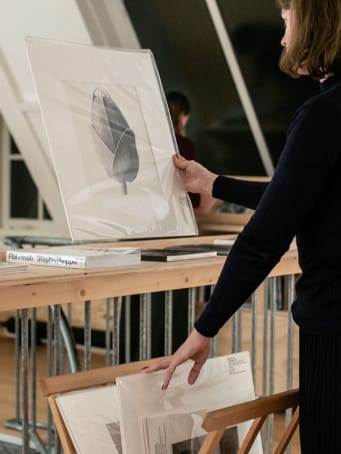 Woman looking at print