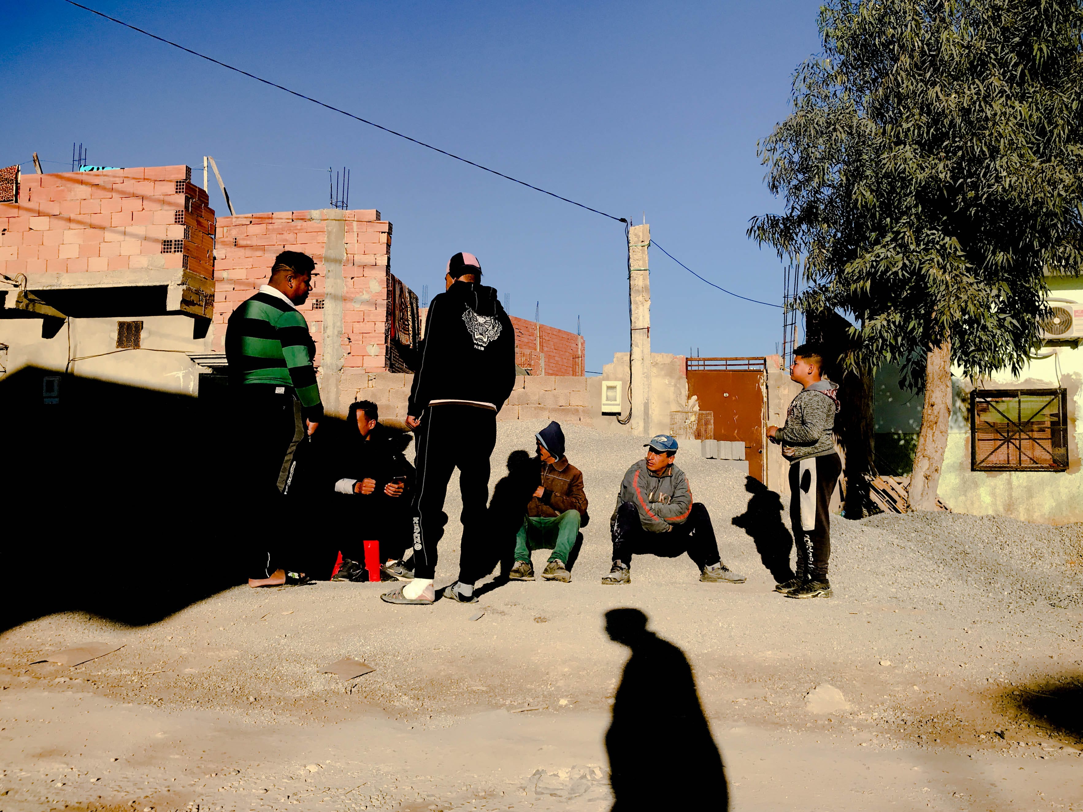 Picture of men on the street in Algeria. © Issam Larkat