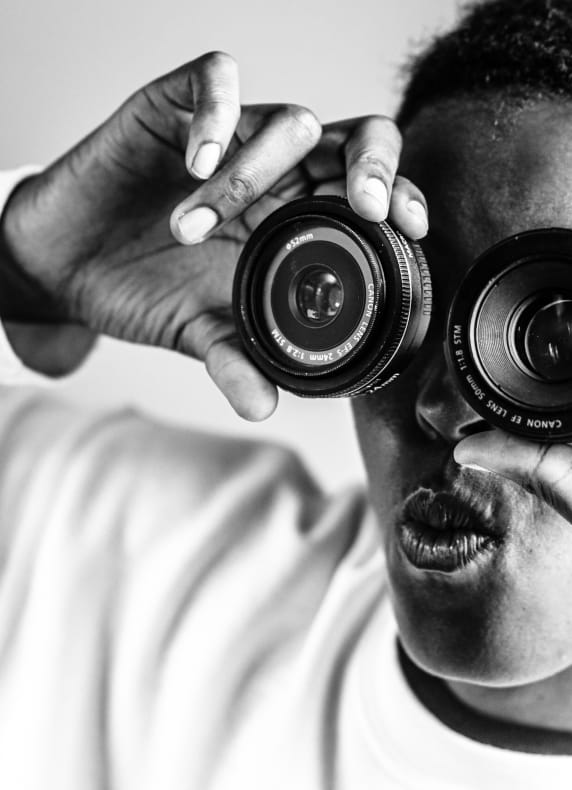 Man holding lenses