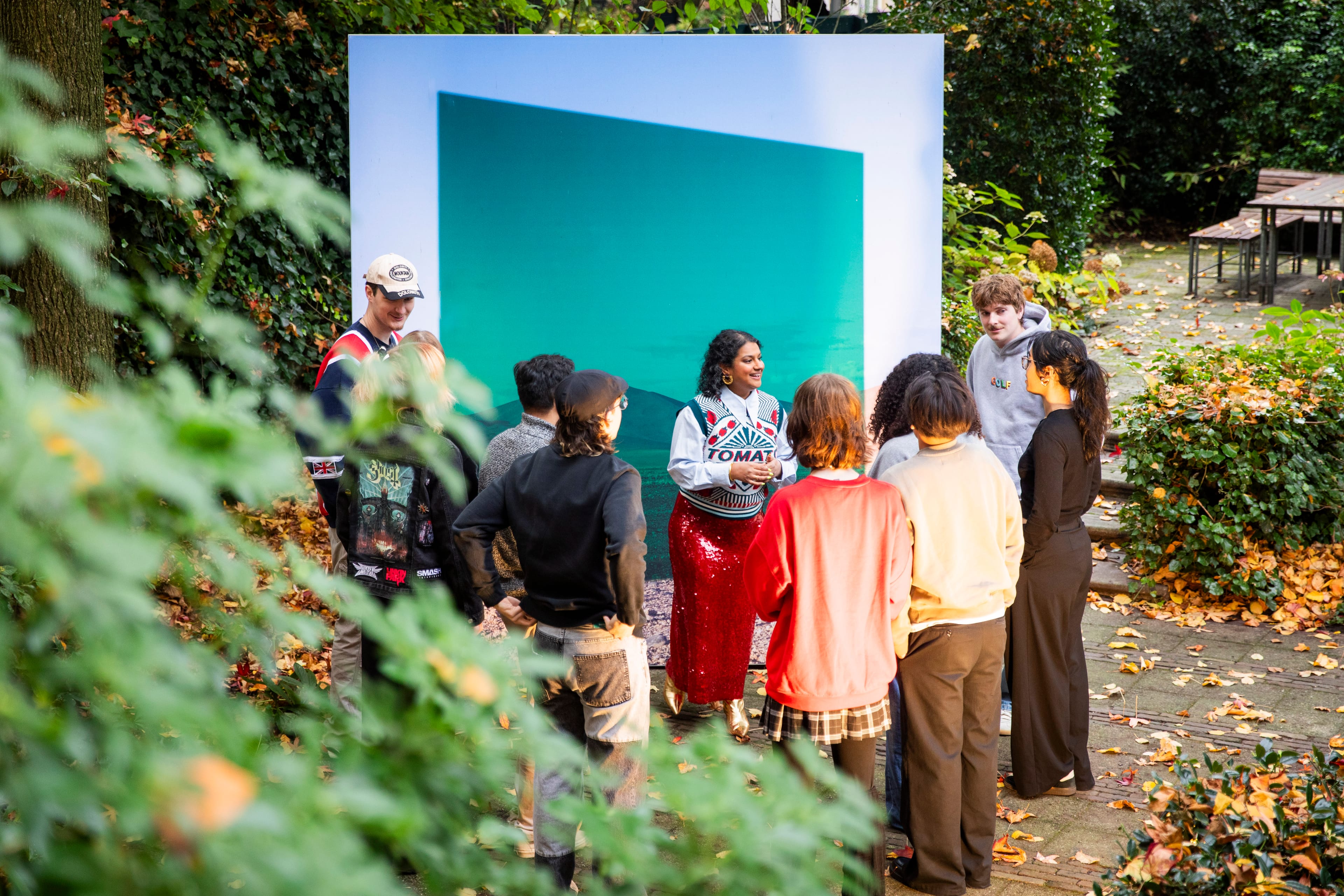 Group of students touring a photography exhibition