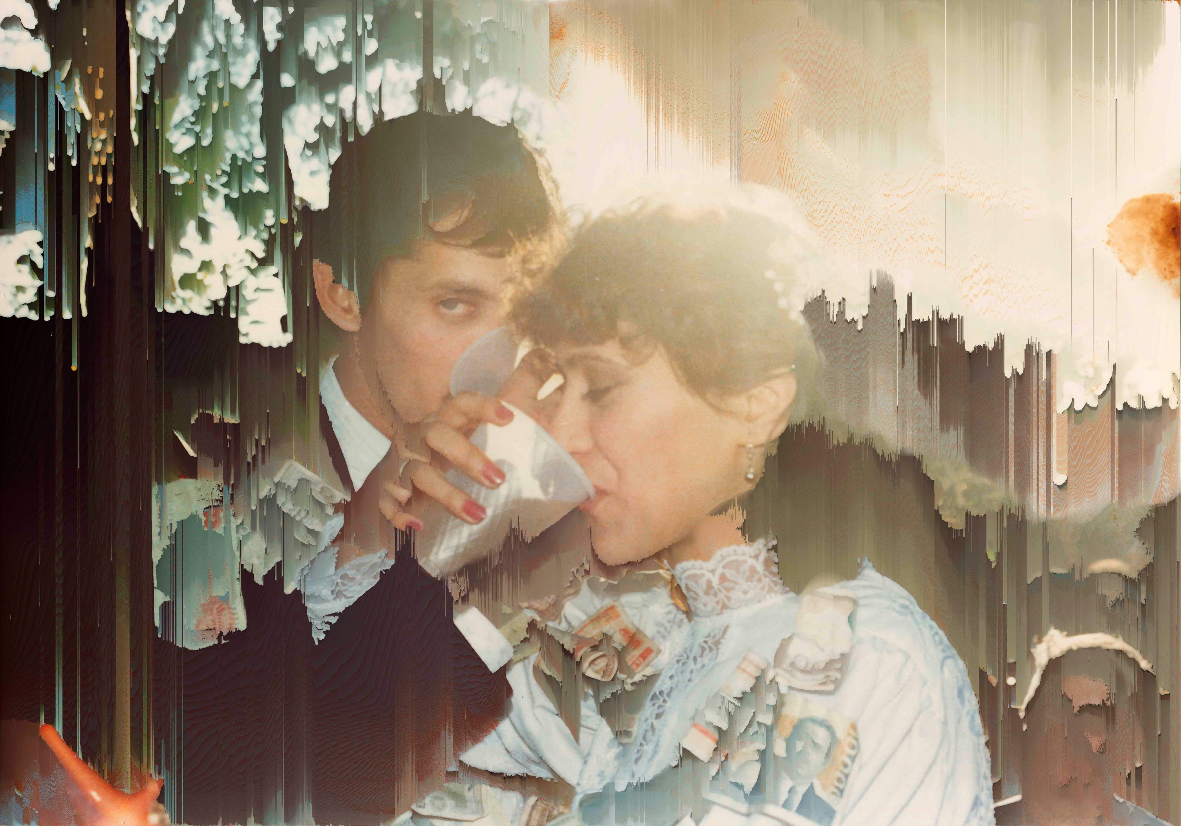 Archival image of the artist's parents wedding, showing them drinking from a cup whilst interlocking arms. The pixels are manipulated in a way that appears to wipe out the photograph© Cristóbal Ascencio Ramos