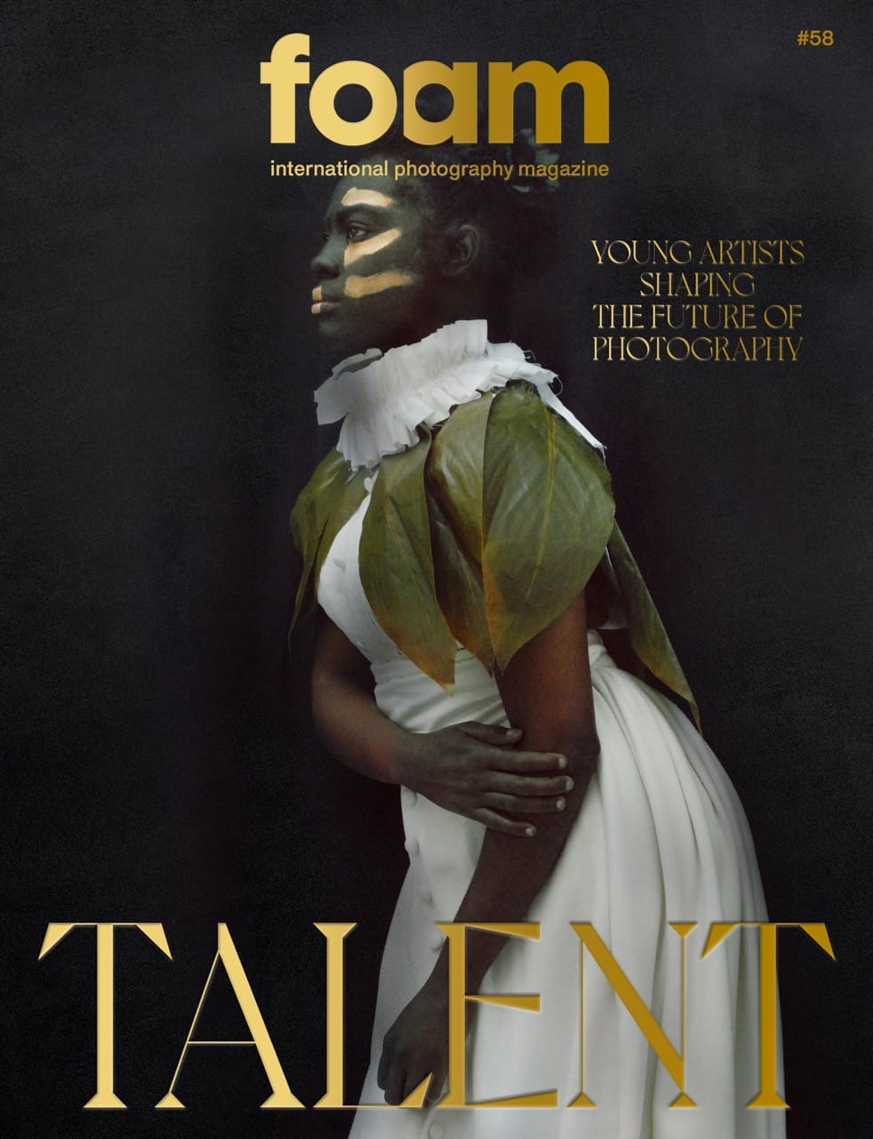 Cover of Foam Magazine featuring a person in a white dress with green leaves, set against a dark background. Text: "Young Artists Shaping the Future of Photography."