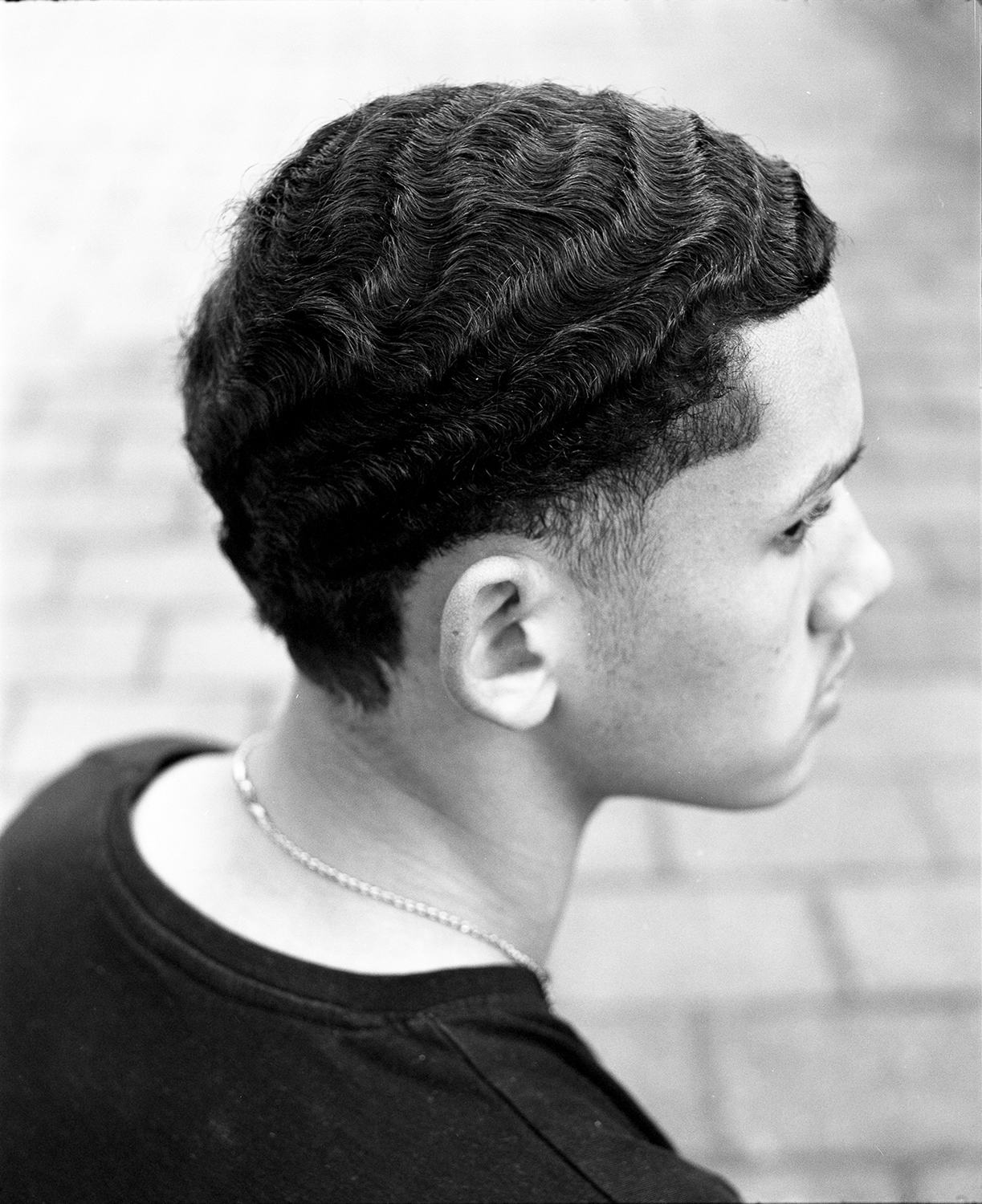 Black and white image of boy's hair by photographer Farren van Wyk