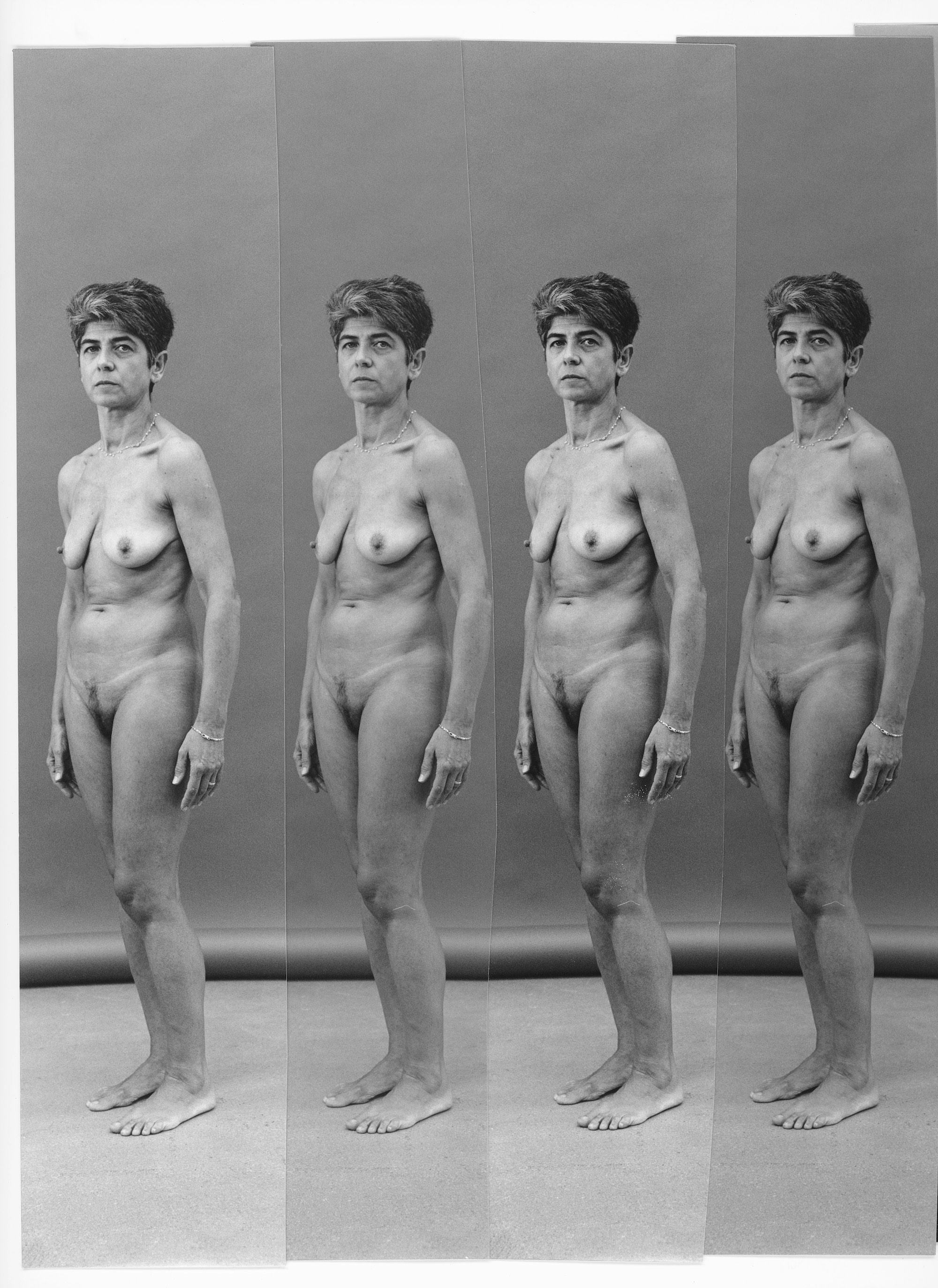 Collage of four black and white identical images of the artist's mother, posing undressed, facing the camera. © Eleonora Agostini