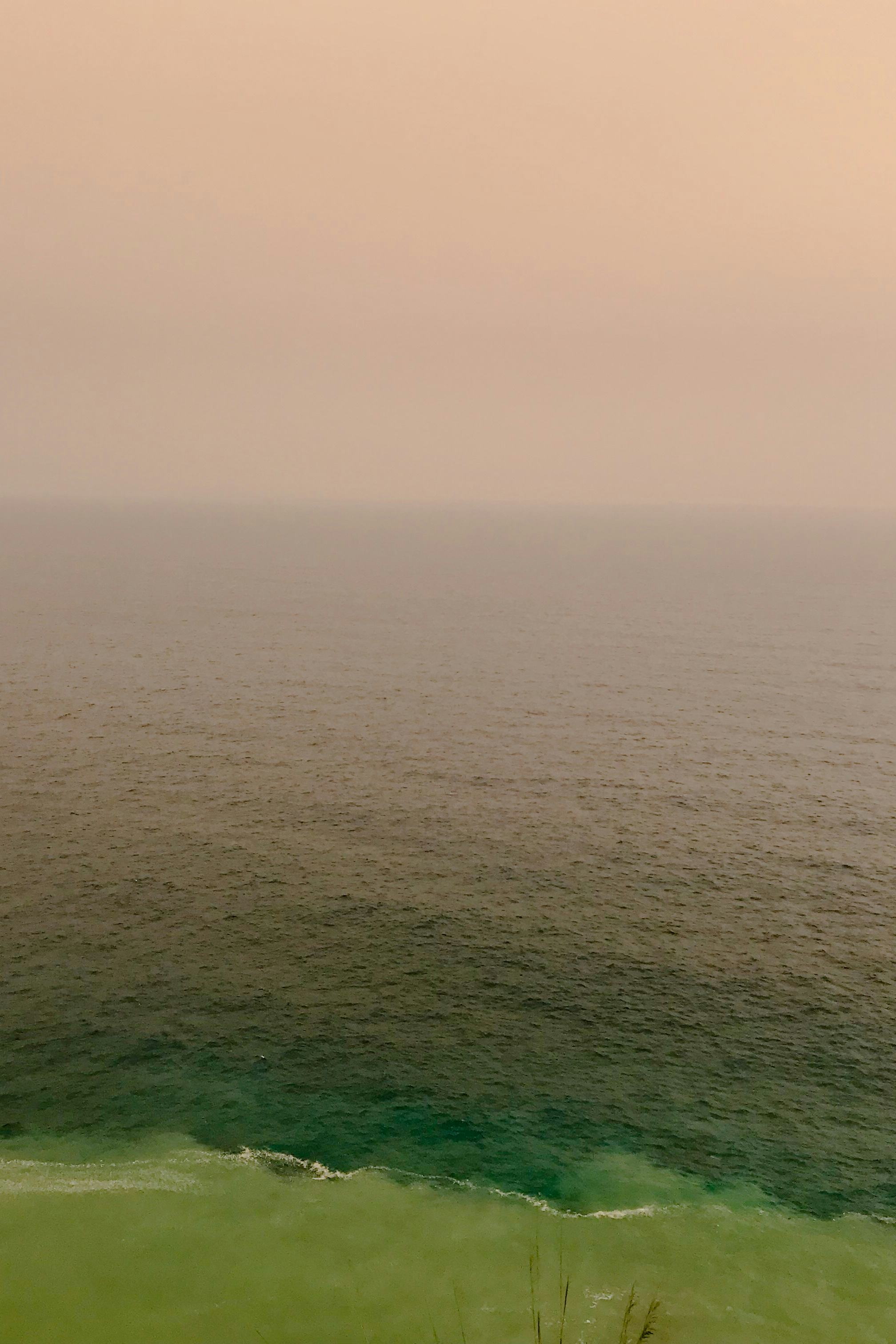 Image of the Mediterranean Sea, in soft pink and green colour tones. © Issam Larkat