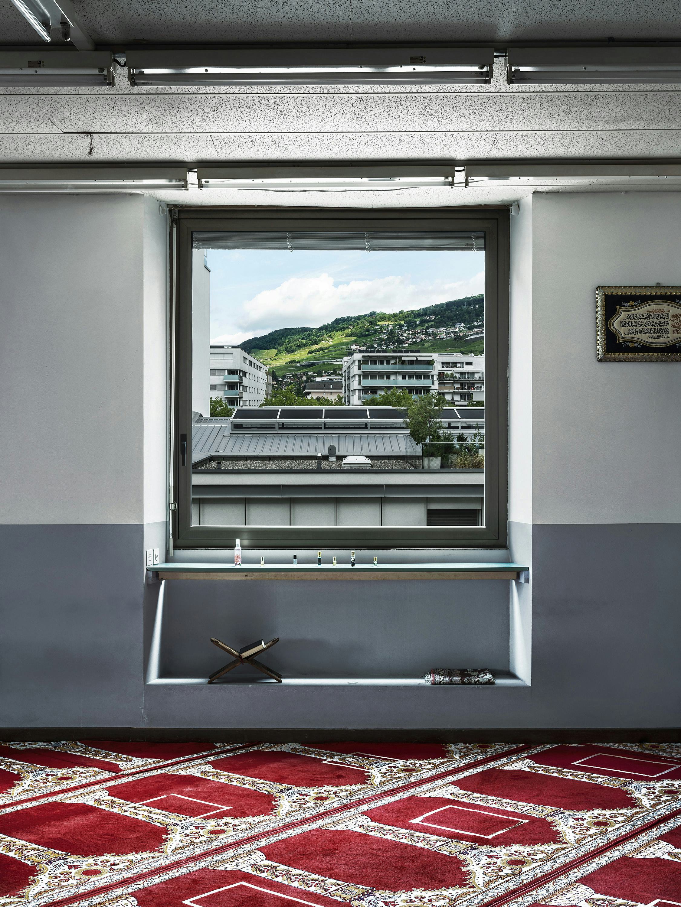 View from inside a mosque onto a Swiss landscape