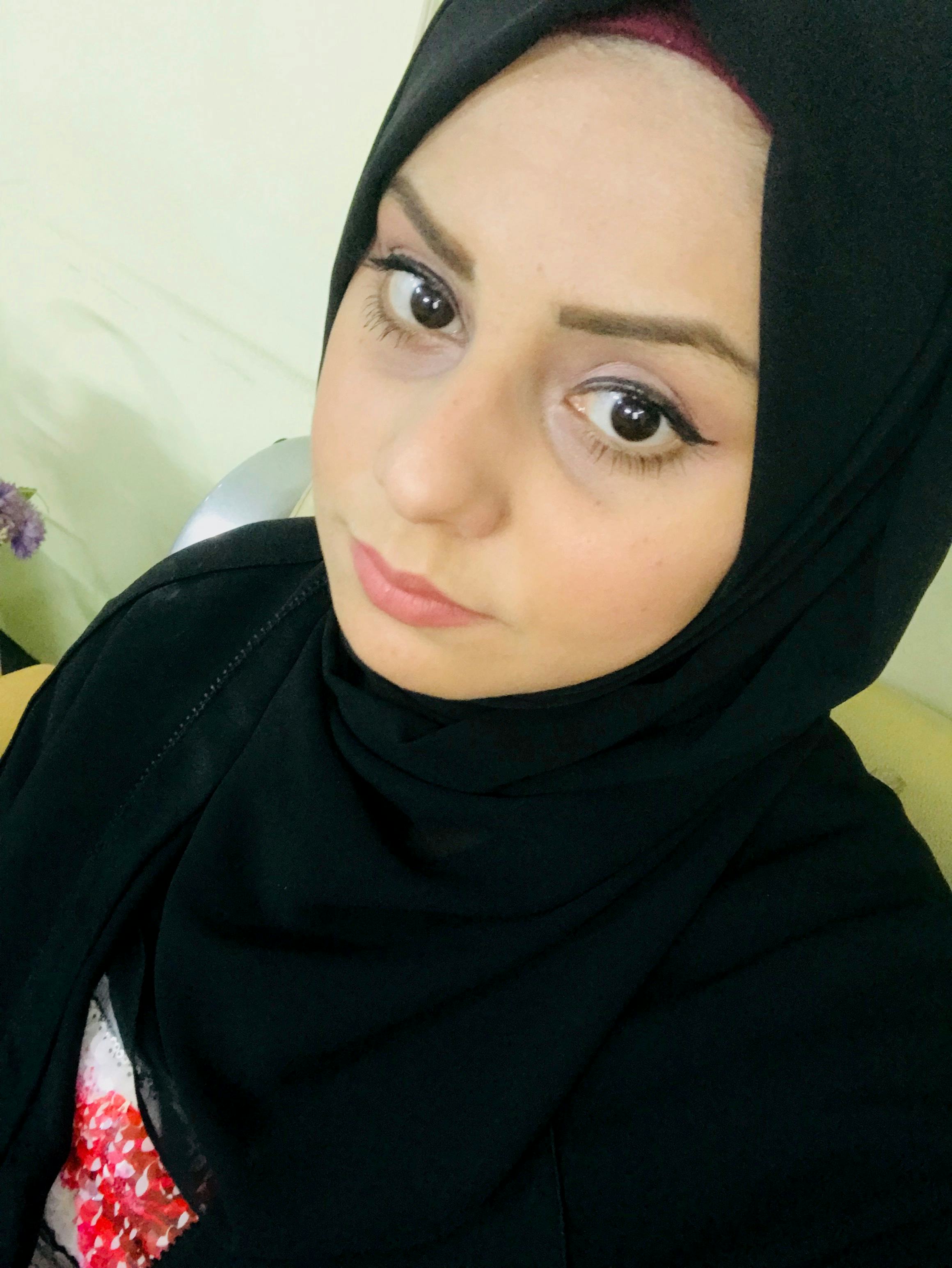 Selfie of a young woman wearing a hijab