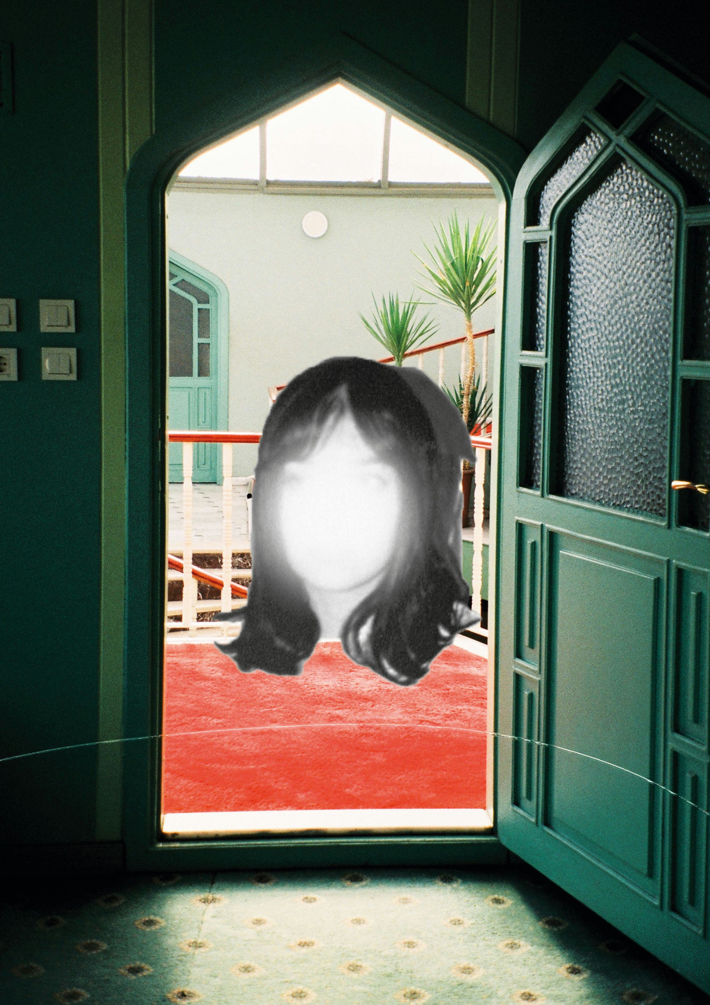 head floating in green door red carpet