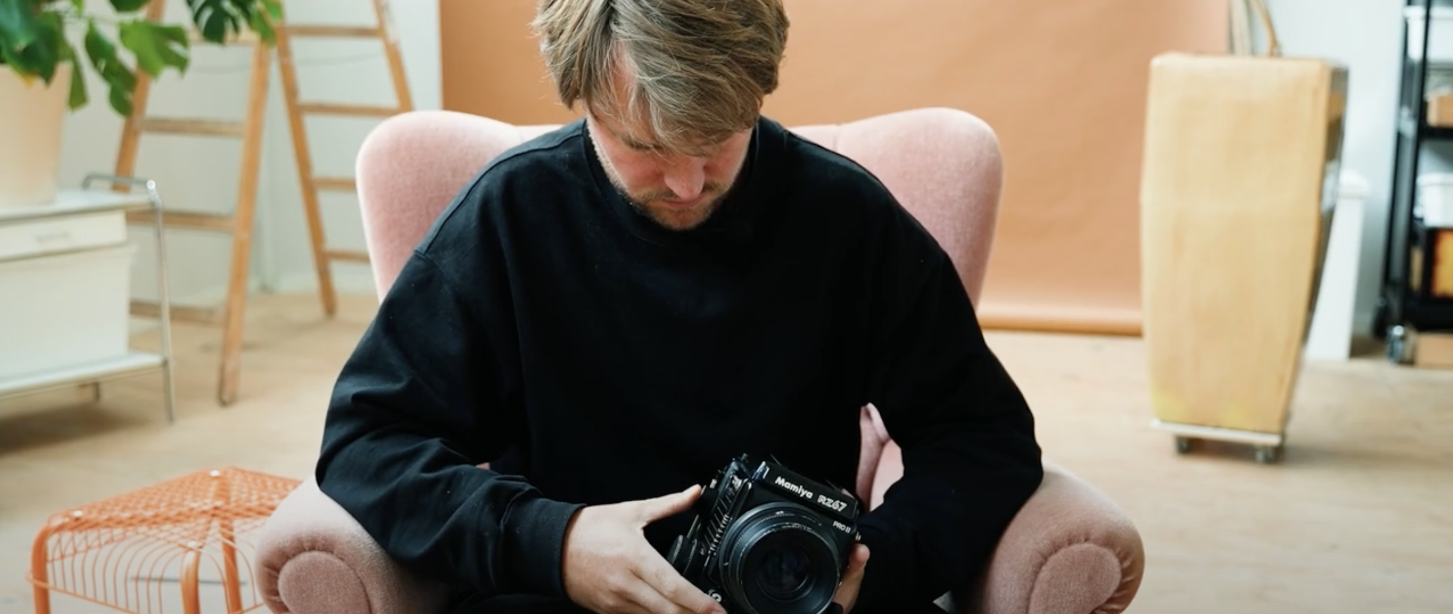 Artist Sem Langendijk showing one of his analogue cameras