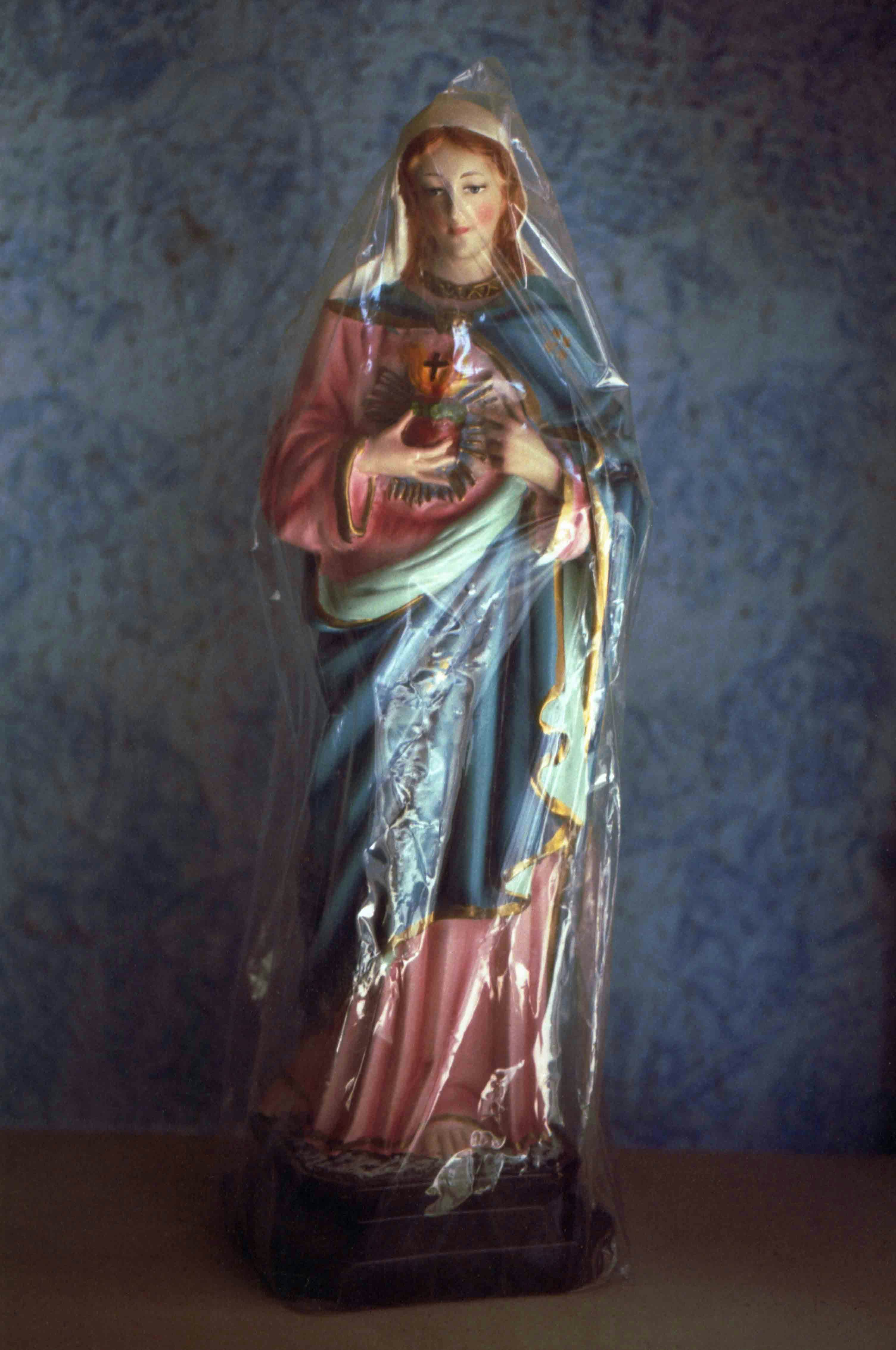 Religious sculpture wrapped in plastic © Marisol Mendez