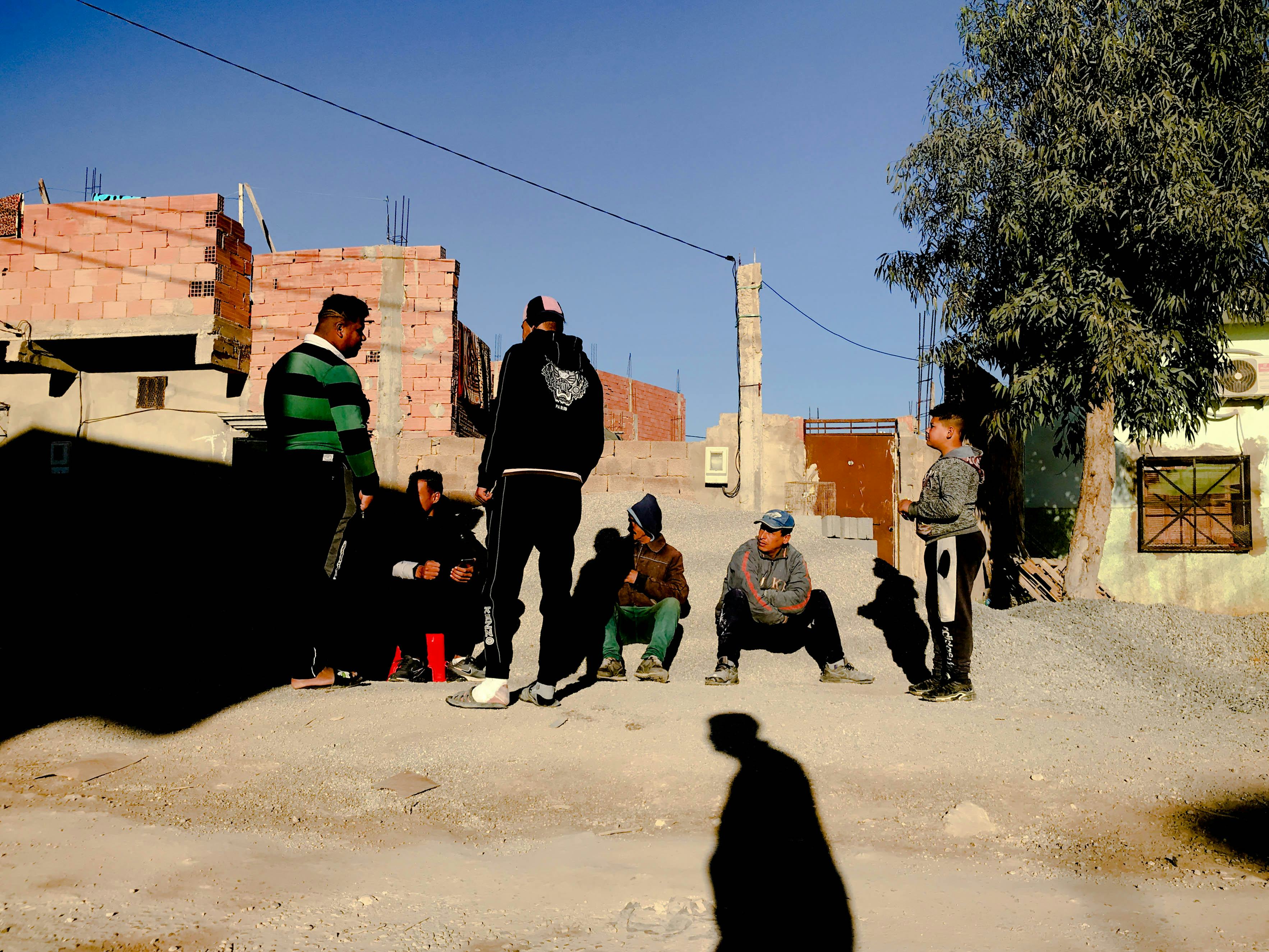 Picture of men on the street in Algeria. © Issam Larkat