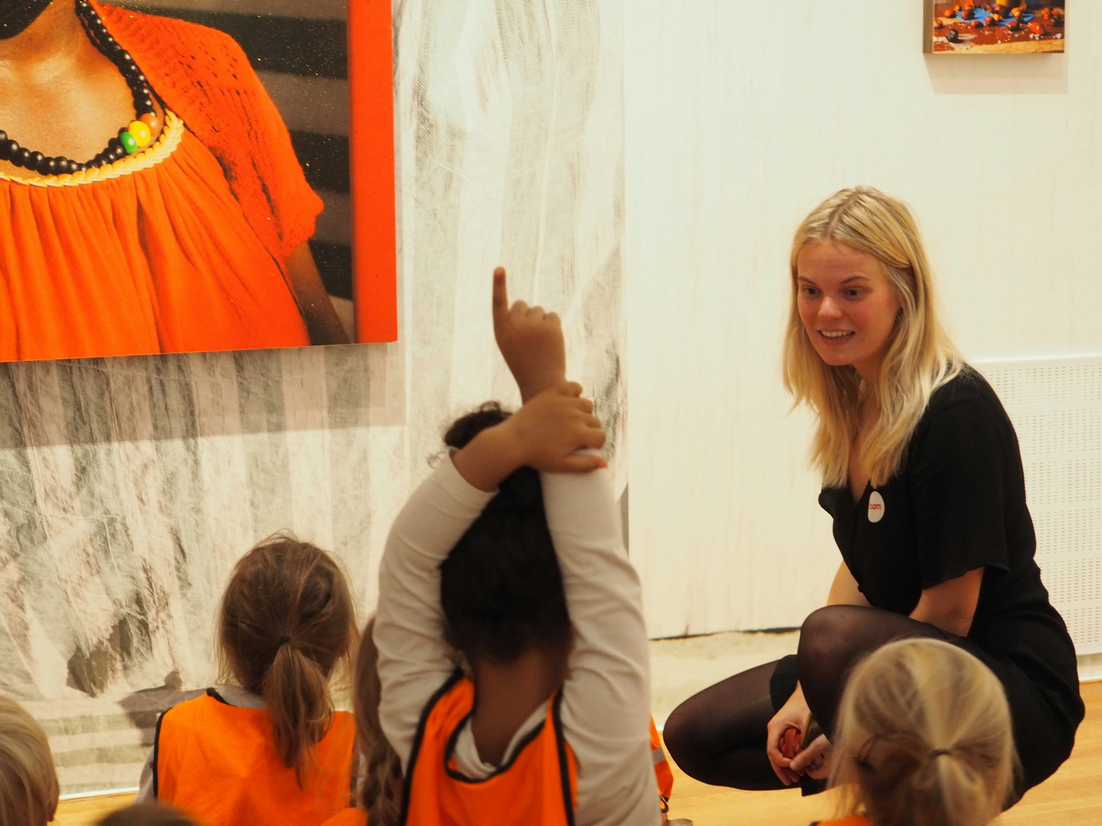 Young children in a museum with a museum teacher