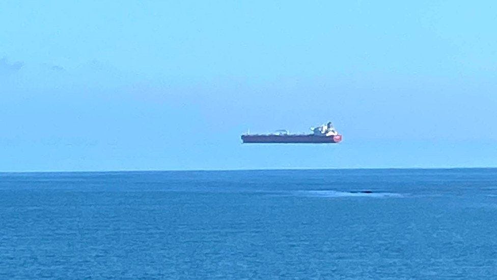 Screenshot of an oil tanker appearing to float above the ocean.